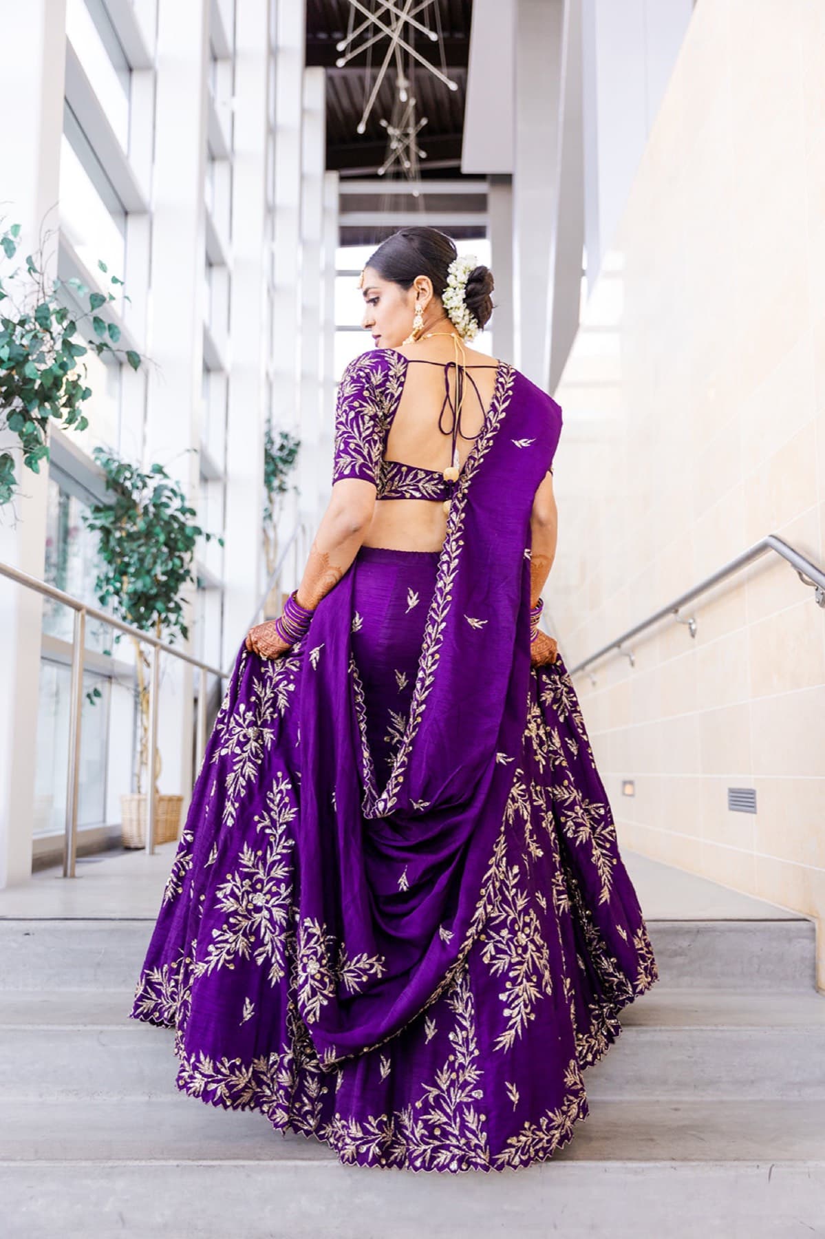 Bride's purple lehenga detail during the satak ceremony, Toronto