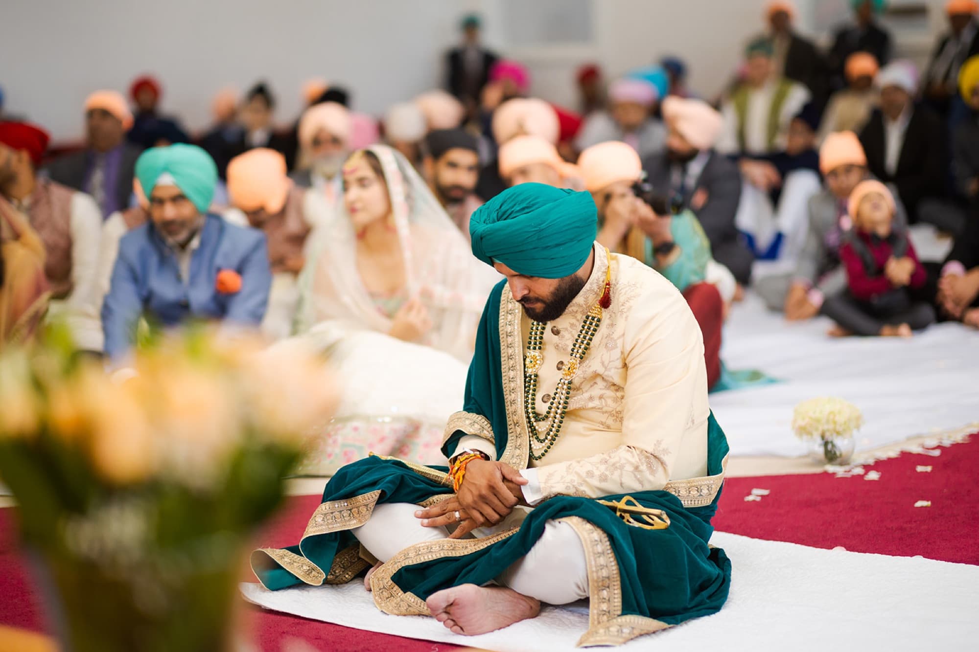 Couple seated during the laavan at the gurdwara, GTA Sikh wedding