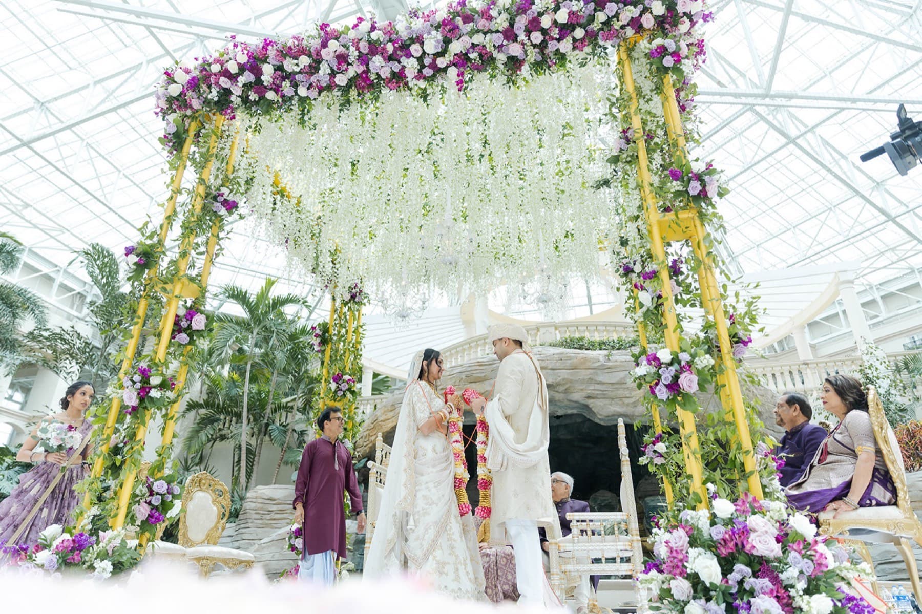 Ceremony beneath the floral mandap, Toronto wedding