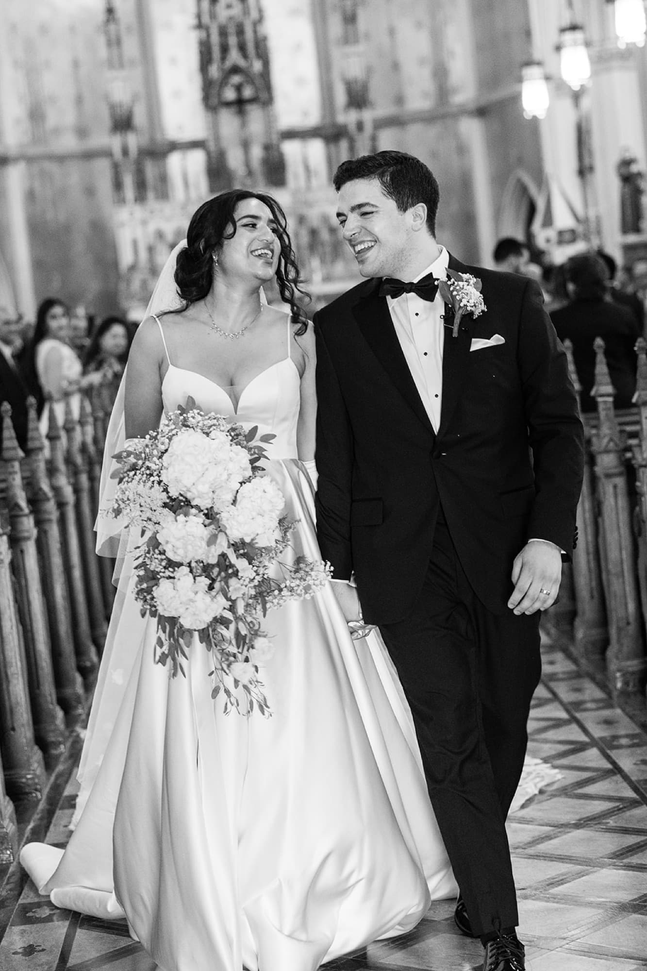 Bride with her bouquet in the church, black and white, Toronto