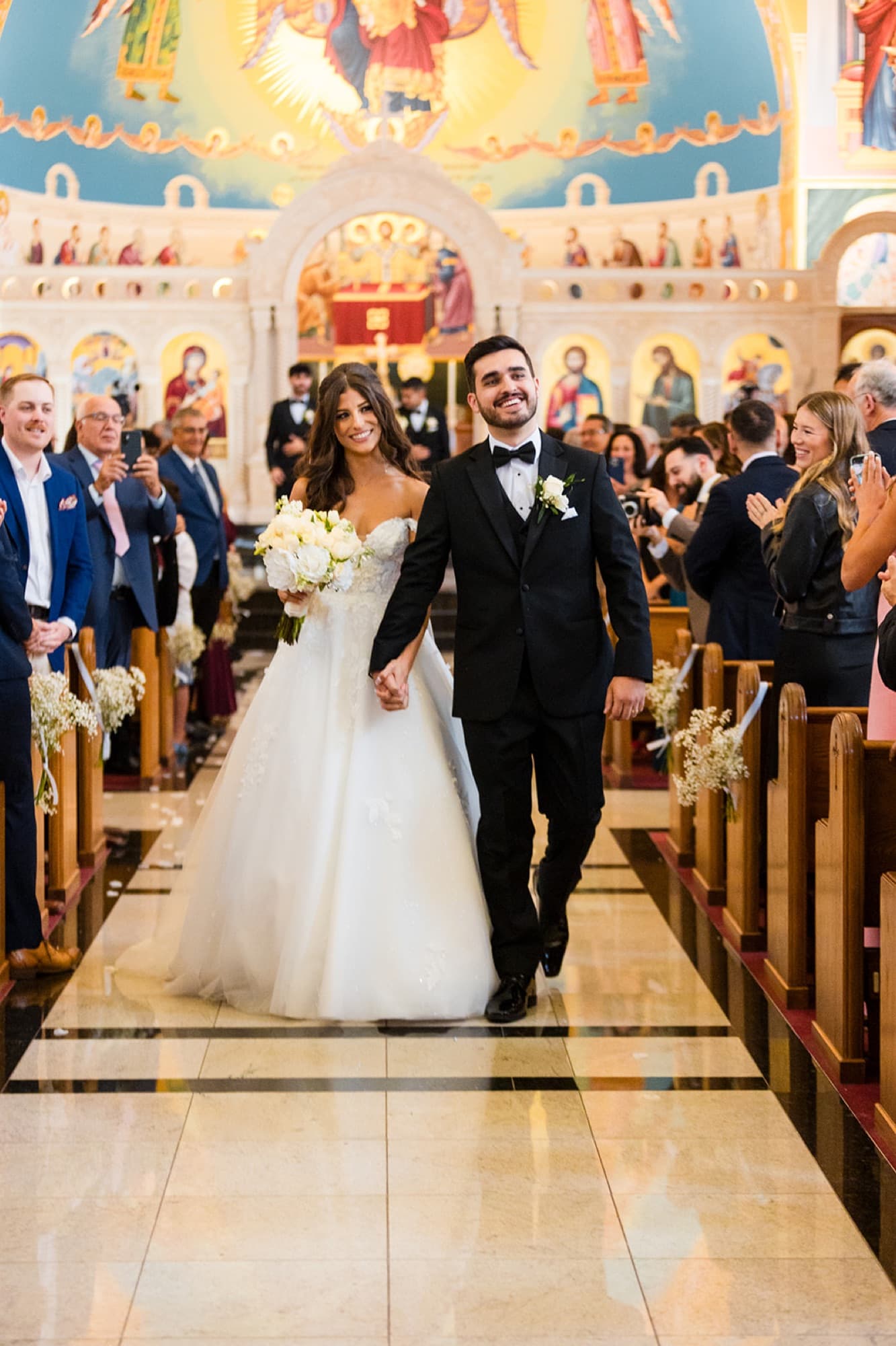Recessional down the church aisle, Toronto wedding