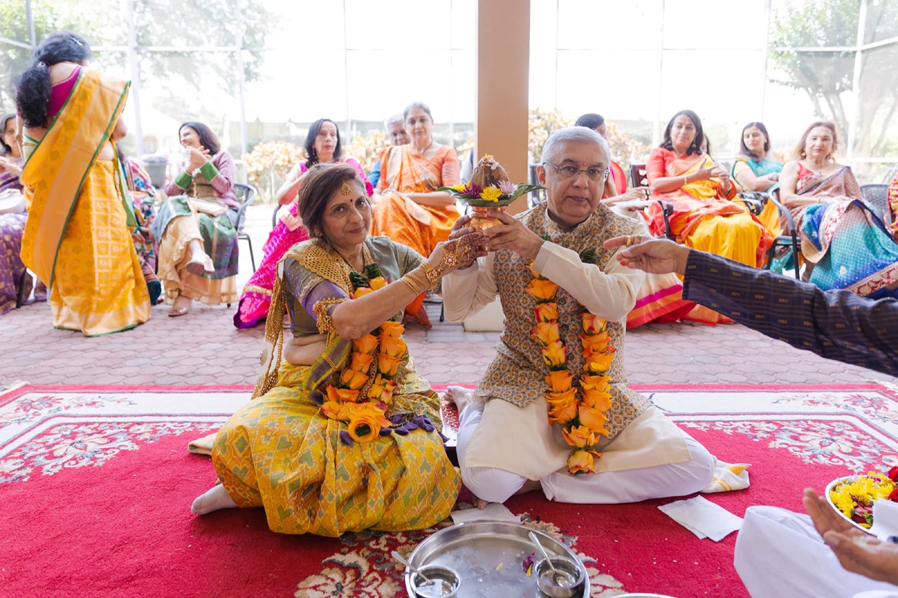 Garland ritual during the haldi ceremony, Toronto South Asian wedding