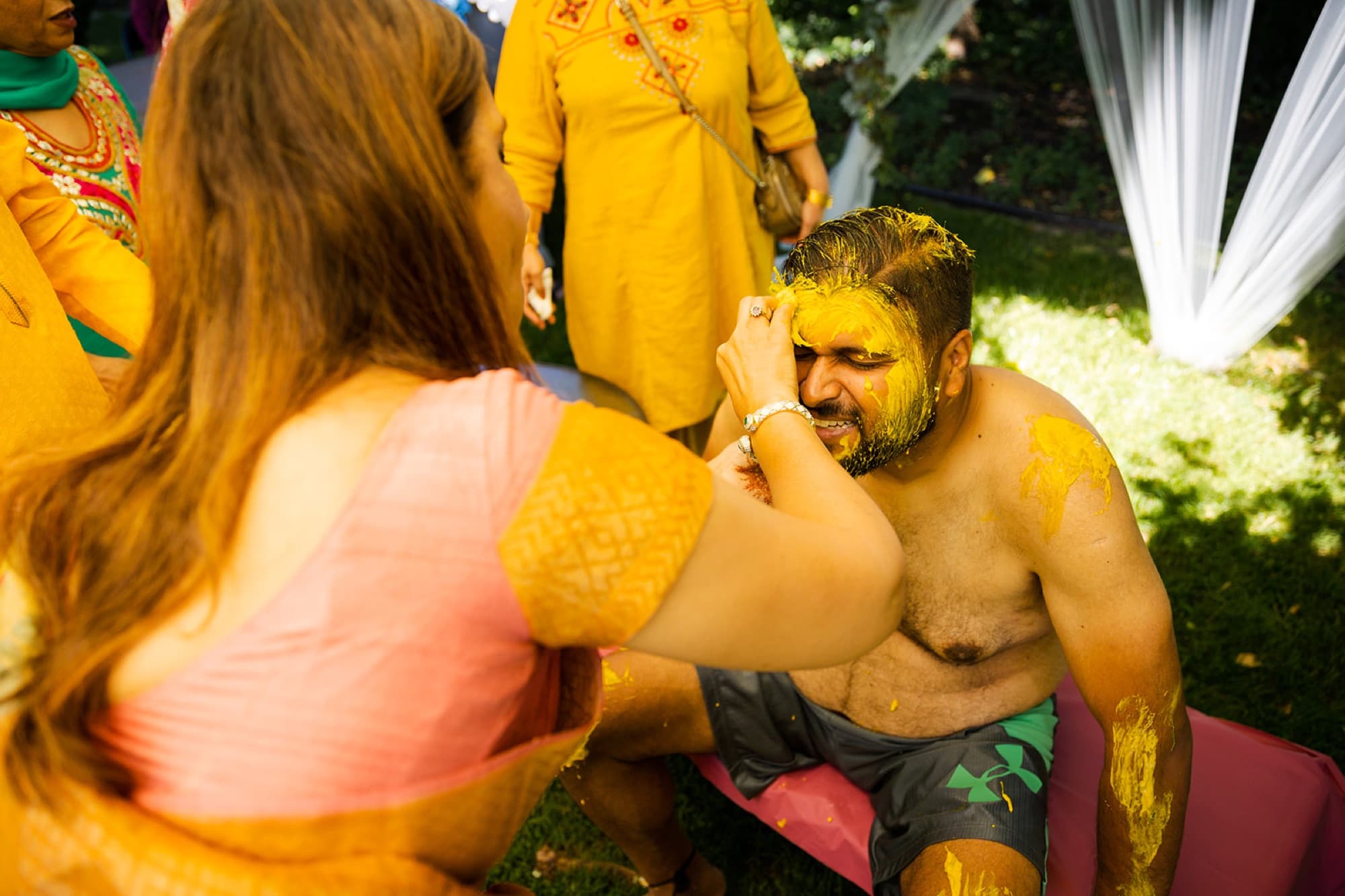 Family applying haldi during the ceremony, GTA Punjabi wedding