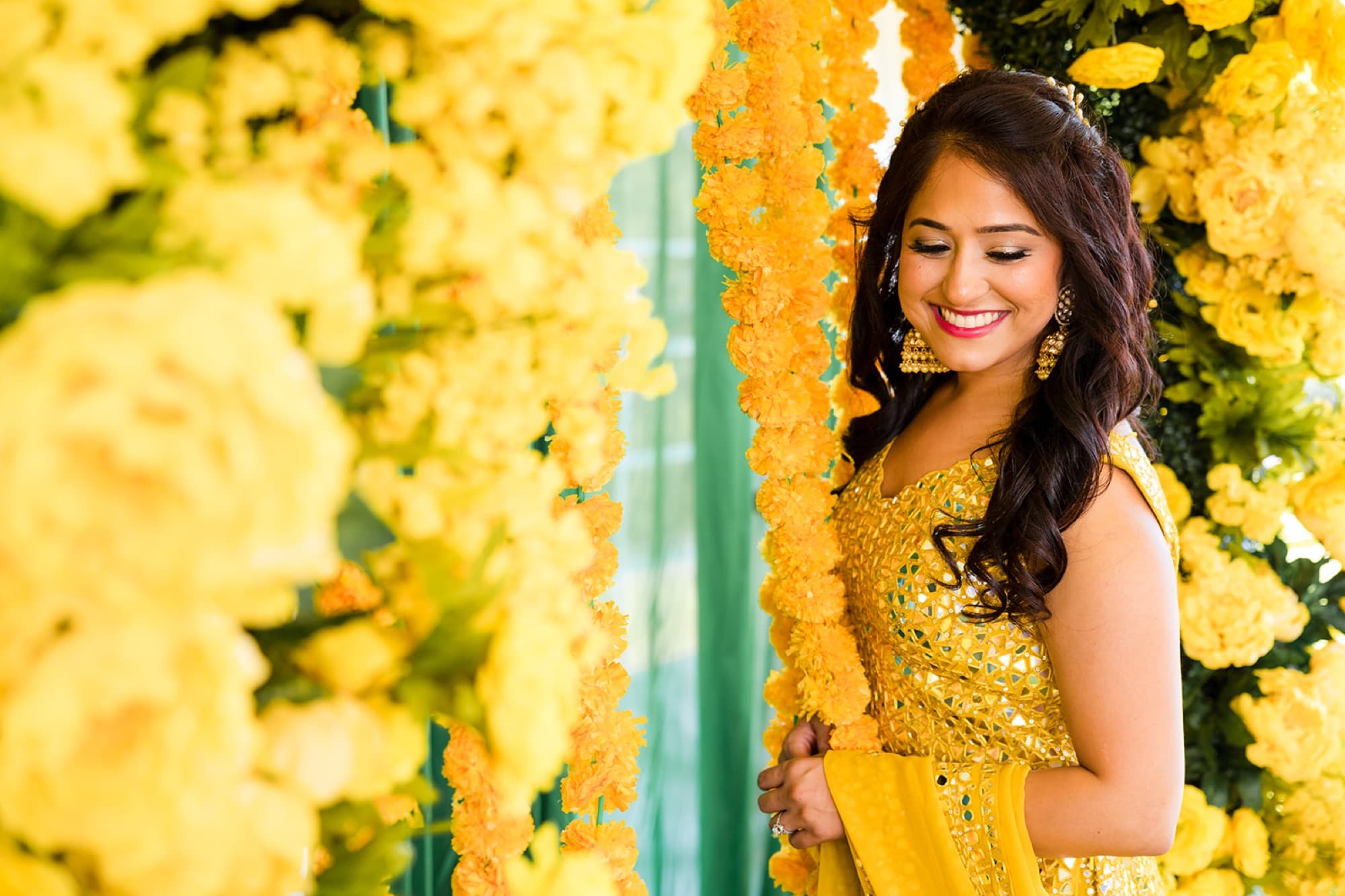 Choora ceremony through the marigolds, Toronto Punjabi wedding