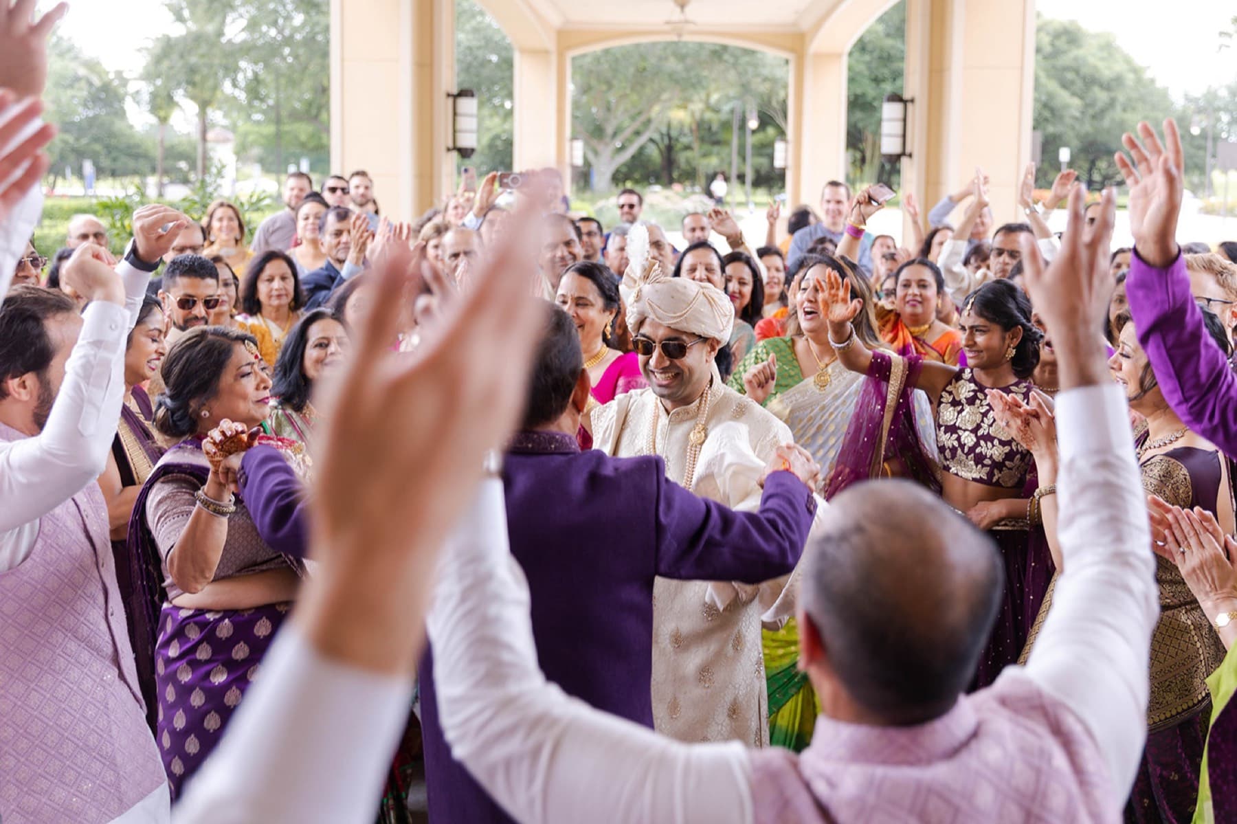 Baraat dancing in the street before the ceremony, Toronto South Asian wedding