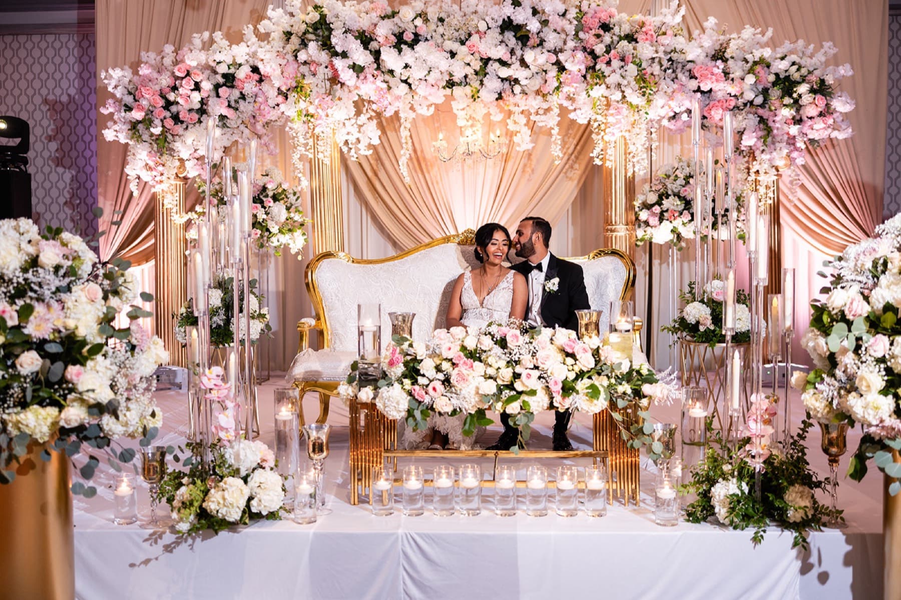 White floral mandap stage before the ceremony, Toronto