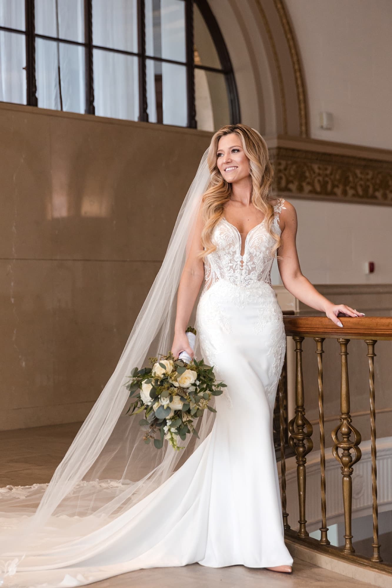 Bride descending the grand staircase, Toronto wedding photography