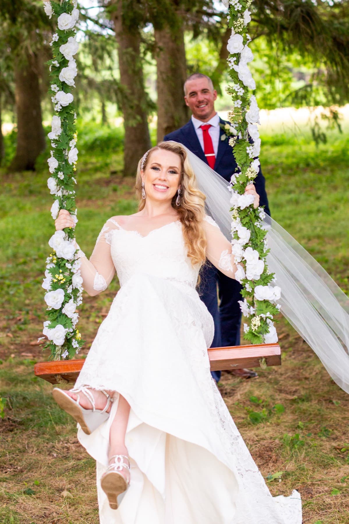 Bride on a garden swing after the ceremony, GTA wedding