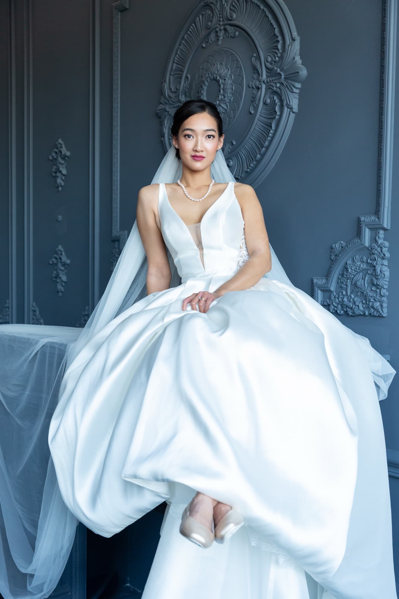 Bride against blue doors, editorial bridal portrait, Toronto