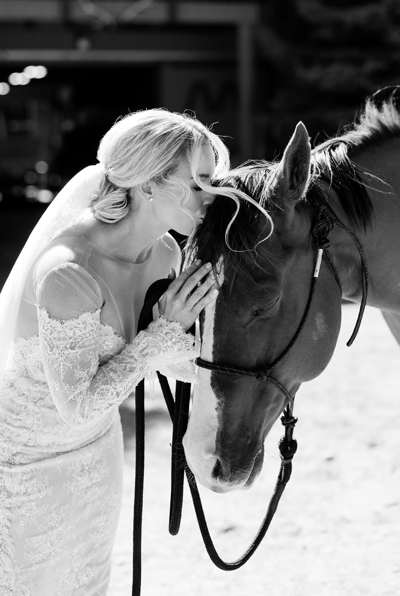 Bride with her horse, black and white, ranch wedding