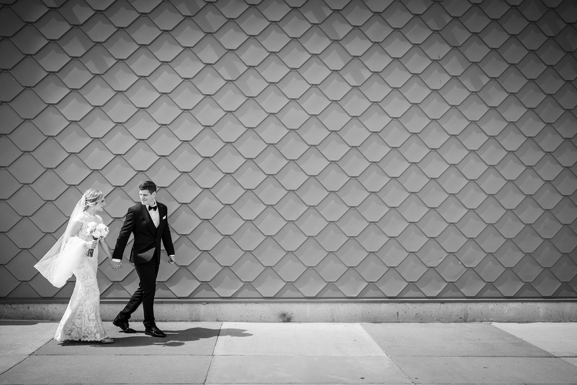 Groom on the rooftop grid, black and white architectural portrait, Toronto