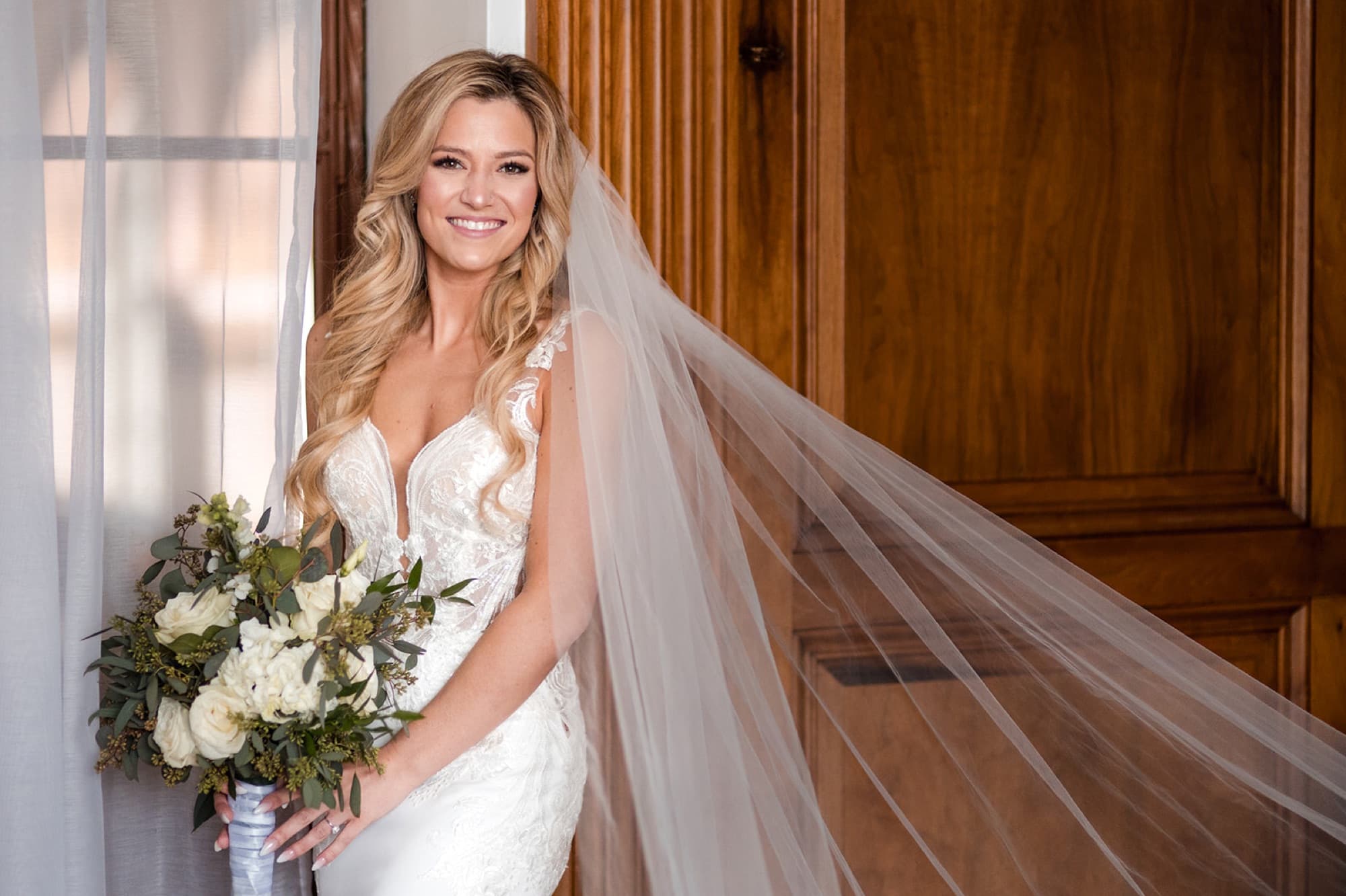 Bride with bouquet under her veil, Toronto wedding photography