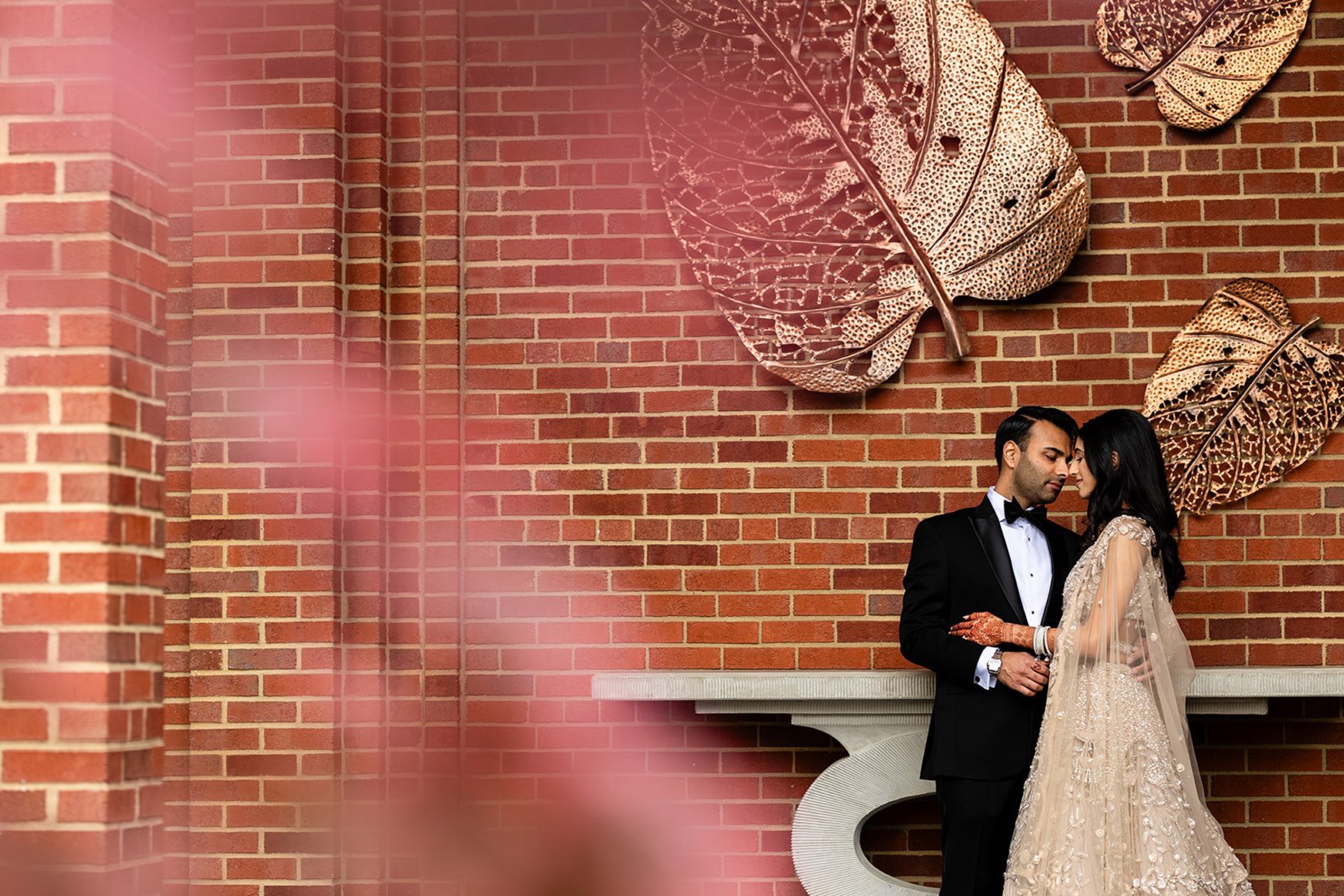 Bride and groom embrace after a South Asian wedding reception, cinematic wedding photography for Toronto and the GTA